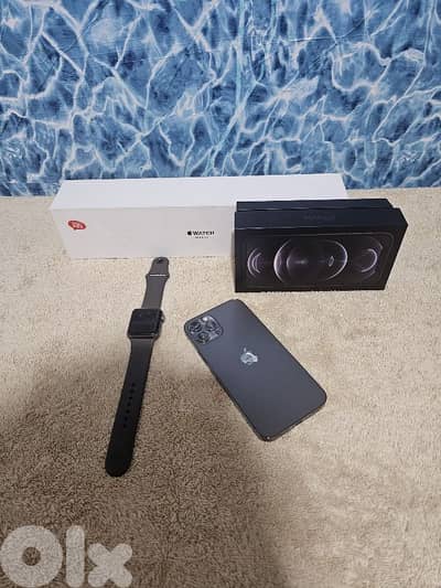 in box iphone 12 pro + Apple Watch in box - one owner