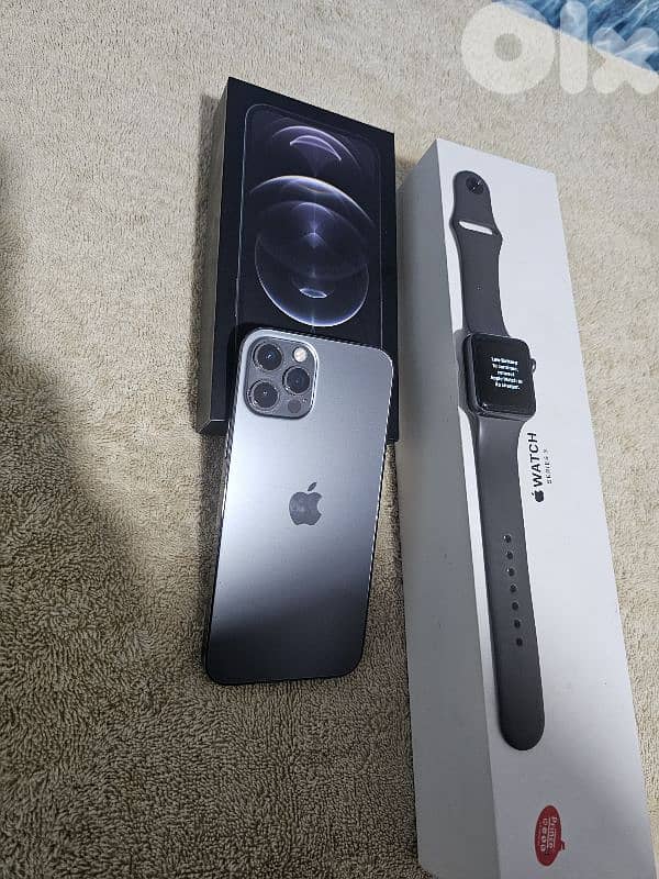 in box iphone 12 pro + Apple Watch in box - one owner 2