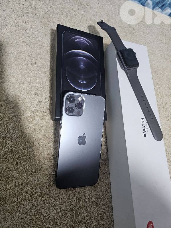 in box iphone 12 pro + Apple Watch in box - one owner 5