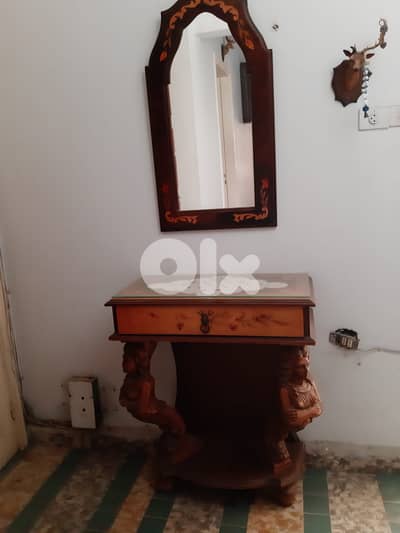 Wooden Console with statute ornement