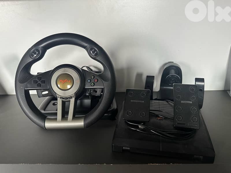 PS4 slim 500gb + racing steering pxn pro 2
