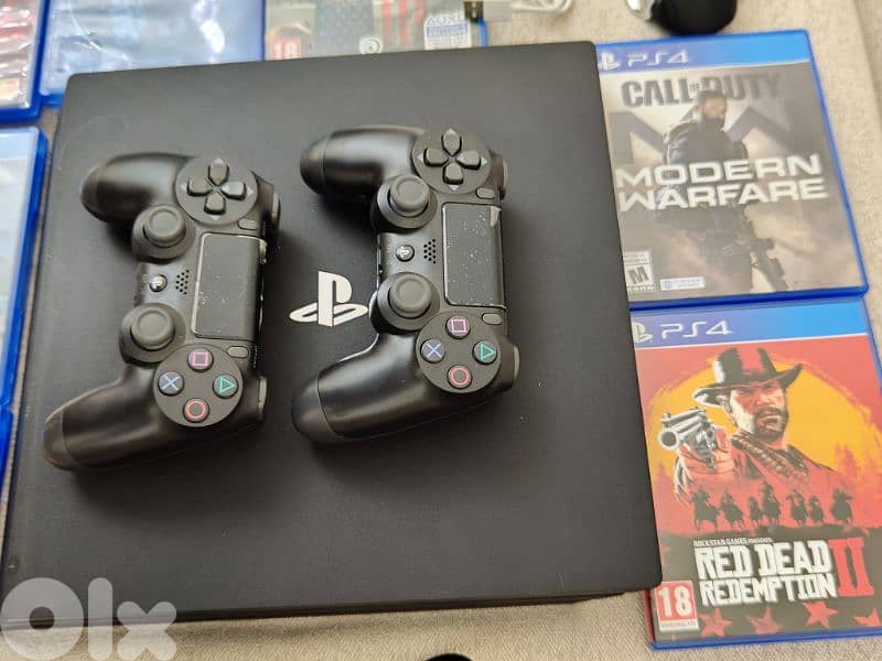 PS4 Pro 1TB used Like new sealed 5