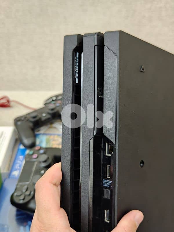 PS4 Pro 1TB used Like new sealed 9