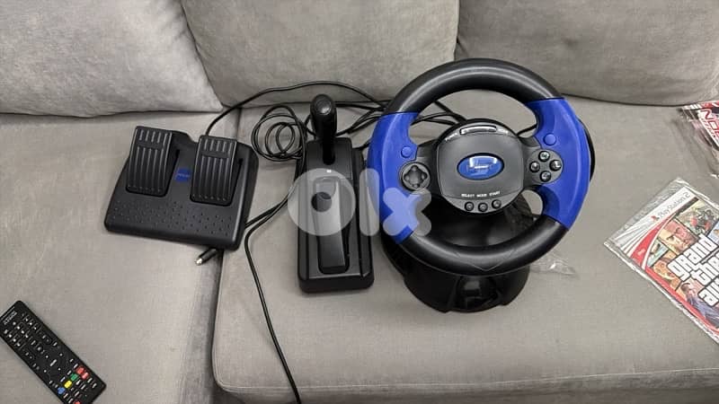 Playstation 2 with Proracing wheel 3