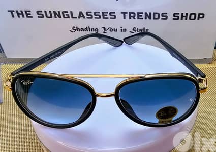 Ray-Ban sunglasses with gradient blue lenses.