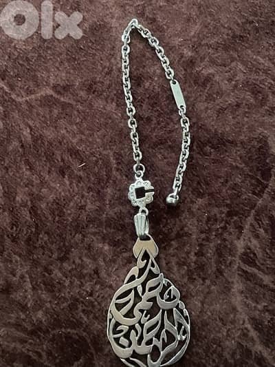 silver key pendant