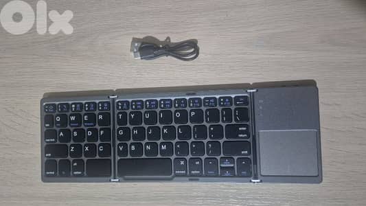 Slim Wireless Bluetooth Keyboard Ultra Thin Foldable Keyboard