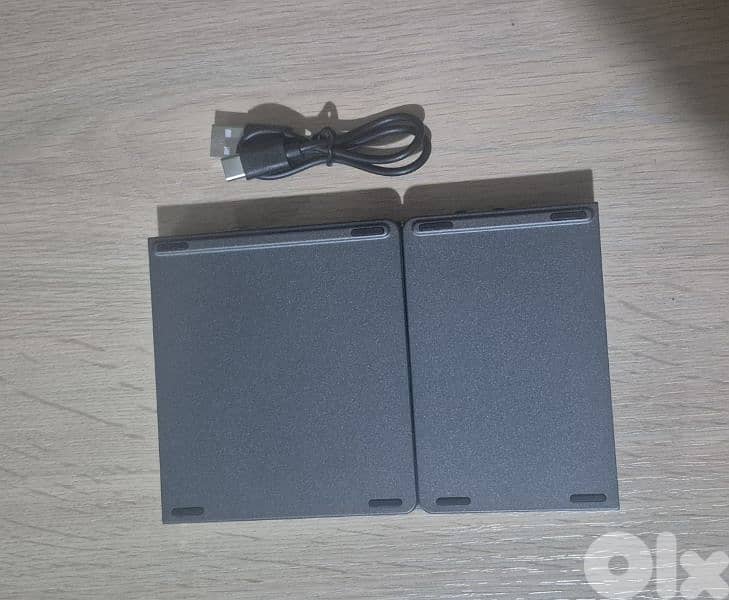 Slim Wireless Bluetooth Keyboard Ultra Thin Foldable Keyboard 1