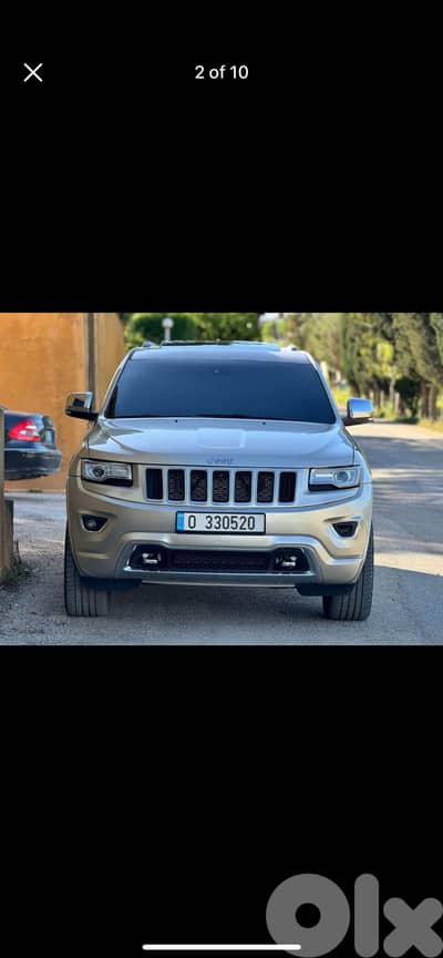Jeep Grand Cherokee 2015 Overland 2015 4*4 gold aleb aswad jeled panor