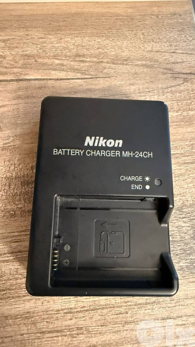 Nikon D3400 is a Digital Single‑Lens Reflex camera (DSLR) 1