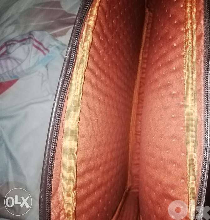 Authentic TUMI laptop bag orange interior like new/شنطه لابتوب تومي 0
