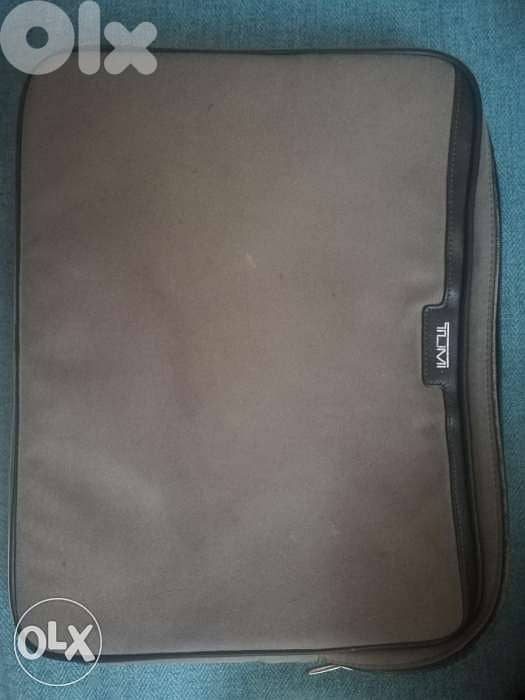 Authentic TUMI laptop bag orange interior like new/شنطه لابتوب تومي 1