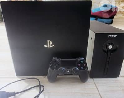 PS4 PRO WITH TWO CONTROL AND UP'S AND THREE GAME'S