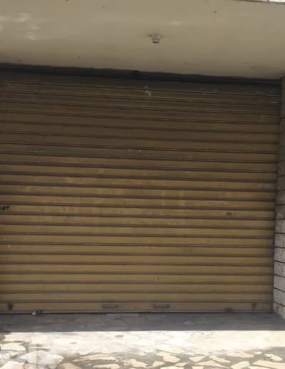 محل ومستودع للايجار في عاليه - مفرق الزهار - خط الشام