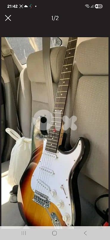 Electrical guitar + Amplifier 1
