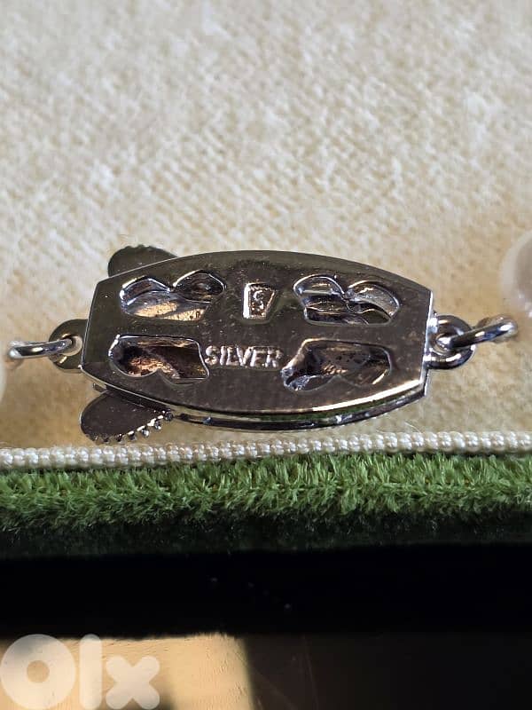 SAKATA PEARL. Necklace and bracelet. 1