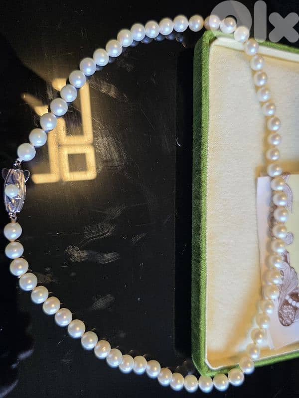 SAKATA PEARL. Necklace and bracelet. 2