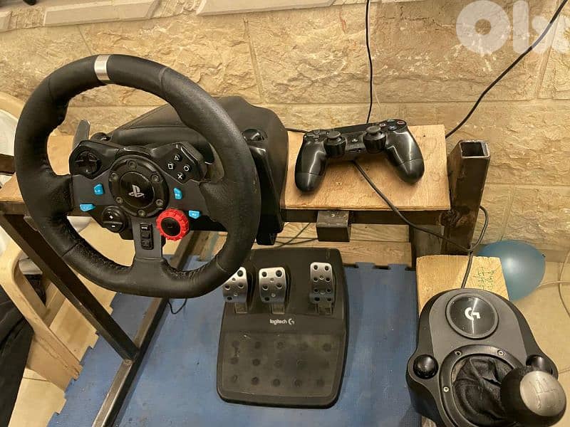 2 ps4 + 6 Joystick + Steering wheel 1