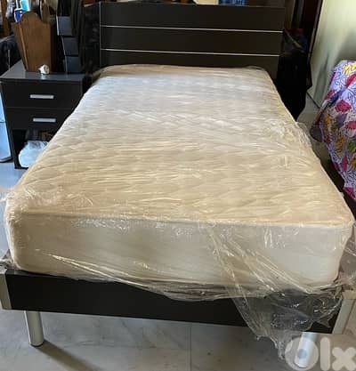 bed barely used with side table
