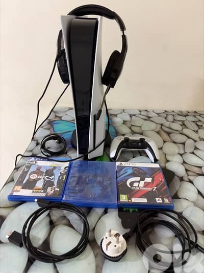 mint clean used  ps5 with a bunch of accessories and games