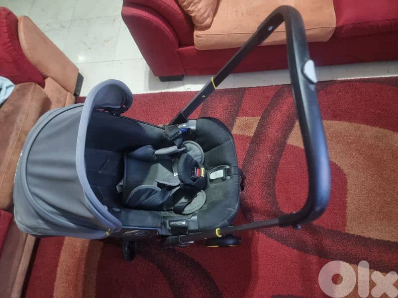 car seat and stroller and a bycicle 1