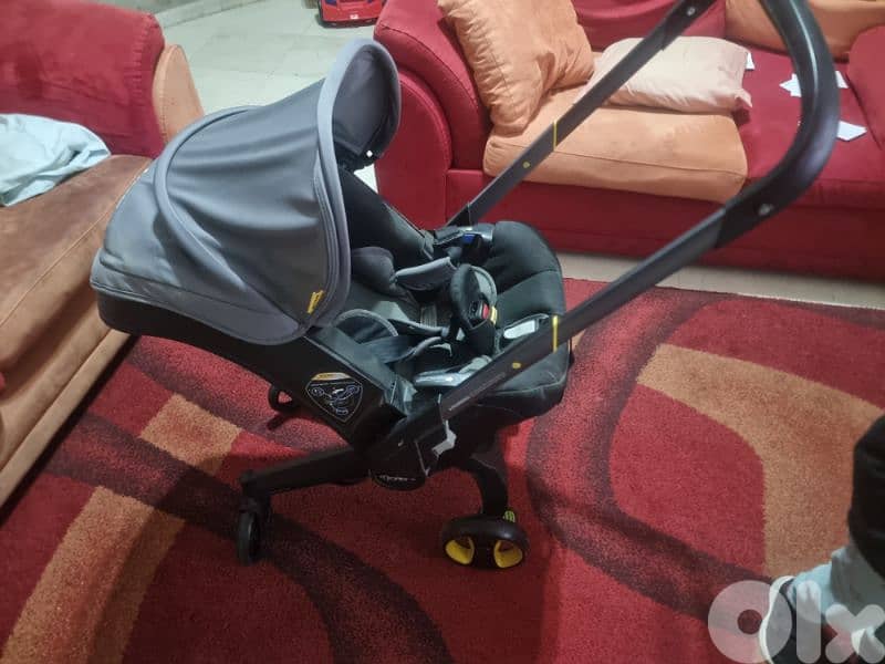 car seat and stroller and a bycicle 2