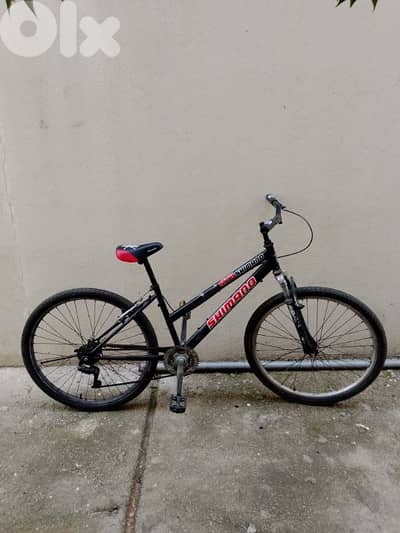 بسكليت للبيع ماركة SHIMANO كلشي فيها شغال مستعمل نضيف قياس26 السعر100$