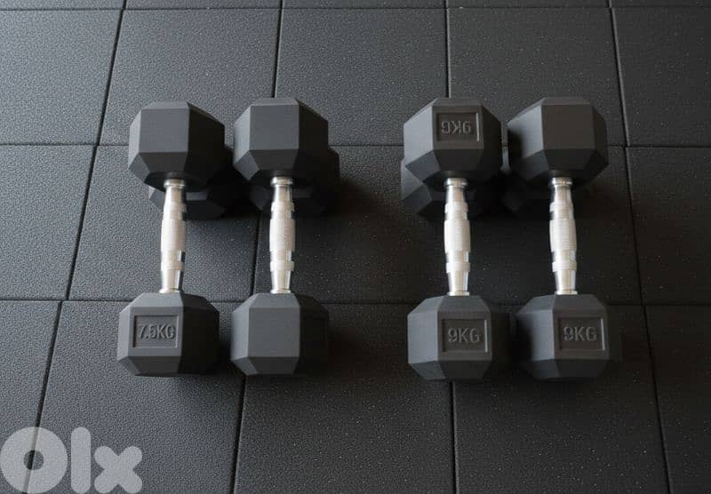 dumbbells  7.5kg and 9kg sets, never used 1