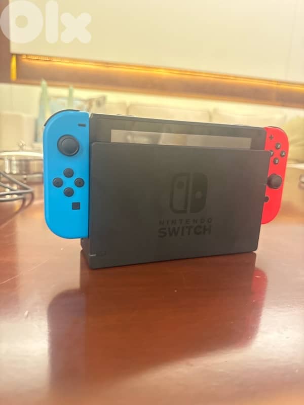 nintendo switch , one free games , stand to connect to tv , controller 2