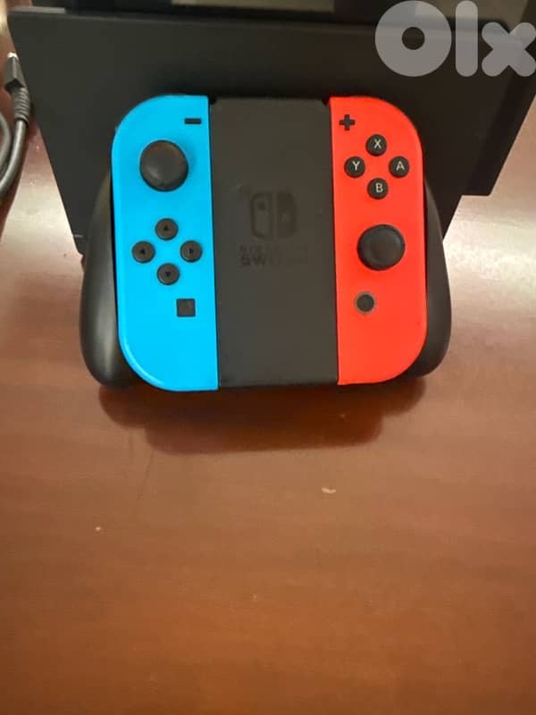 nintendo switch , one free games , stand to connect to tv , controller 4