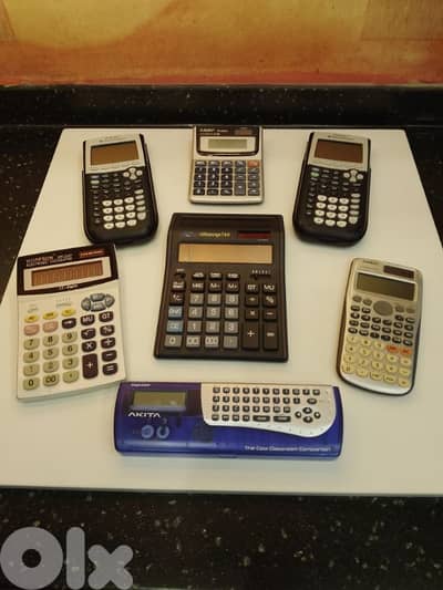 Total of 7 Electronic n Scientific Calculators