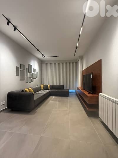 A Modern Furnished apartment for rent in Achrafieh in a very nice Bldg