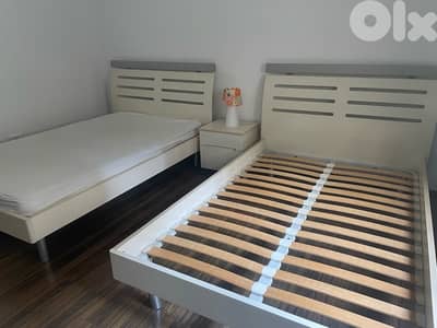 2 bed wood with bedside table