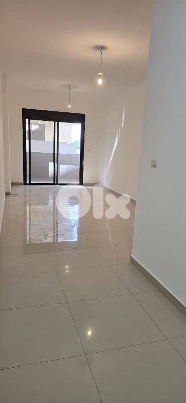 zouk mosbeh 115m 2 bed 2 wc first floor  for 120,000$