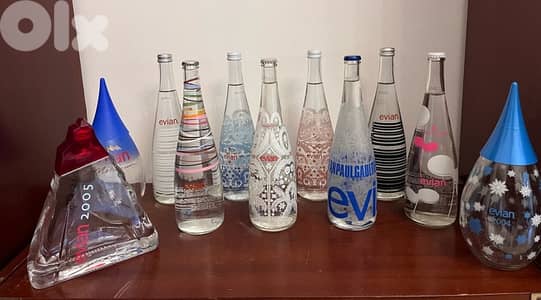 Evian Bottles collection 9 sealed 2 empty.