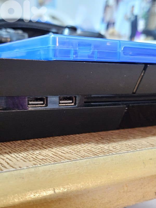 used ps4 with 2 original consoles, cd fifa25 3
