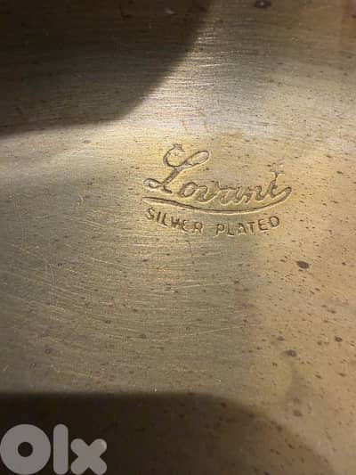 قطعة ملبسة فضة