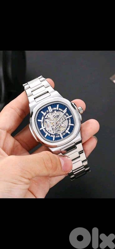 Luxury Silver Skeleton Watch - Royal Blue & Mechanical Steel Edition