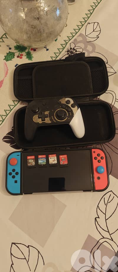 Barely used Nintendo switch Oled with games and accessories