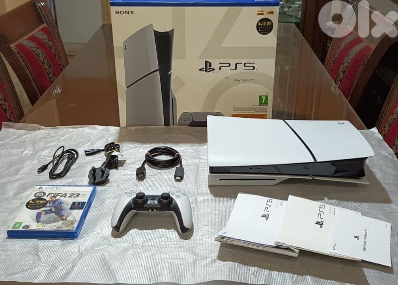 Playstation 5 slim European with one controller All cable and one game 1