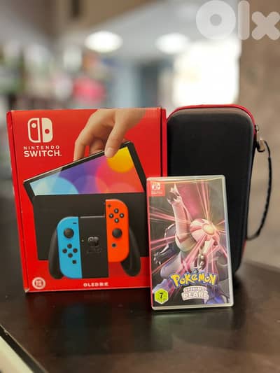 nintendo switch oled super clean with box and game
