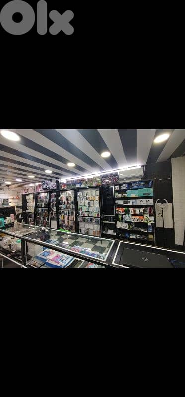 ديكور محل تلفونات للبيع