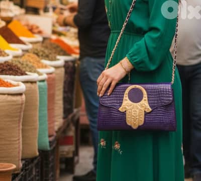 purple leather clutch