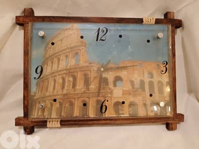 ساعة حائط عالبطارية خشب وزجاج