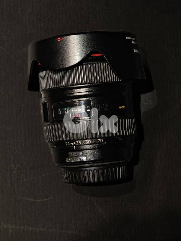 canon camera + lens + speedlite 2