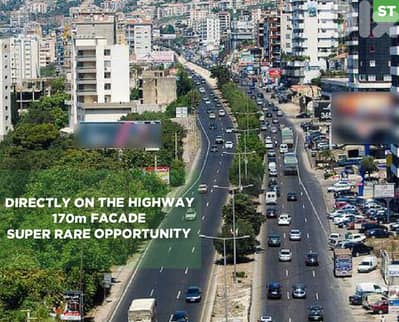 directly on the highway, prime area,Haret Sakher/حارة صخر REF#ST133504