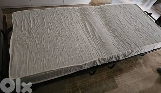 Foldable bed - تخت