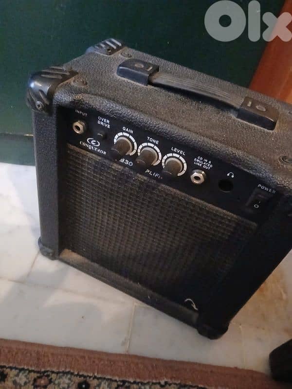 Electric guitar + amp 1