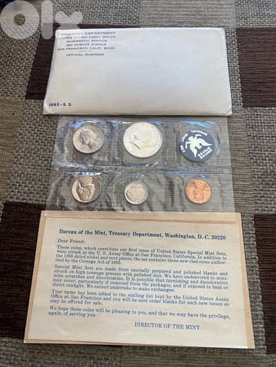 مجموعة عملة أميركي بالمغلف الأساسي تتضمن نصف دولار فضة اصدار سنة ١٩٦٥