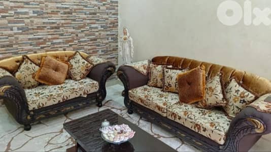 2 sofa chairs and 2 sofas